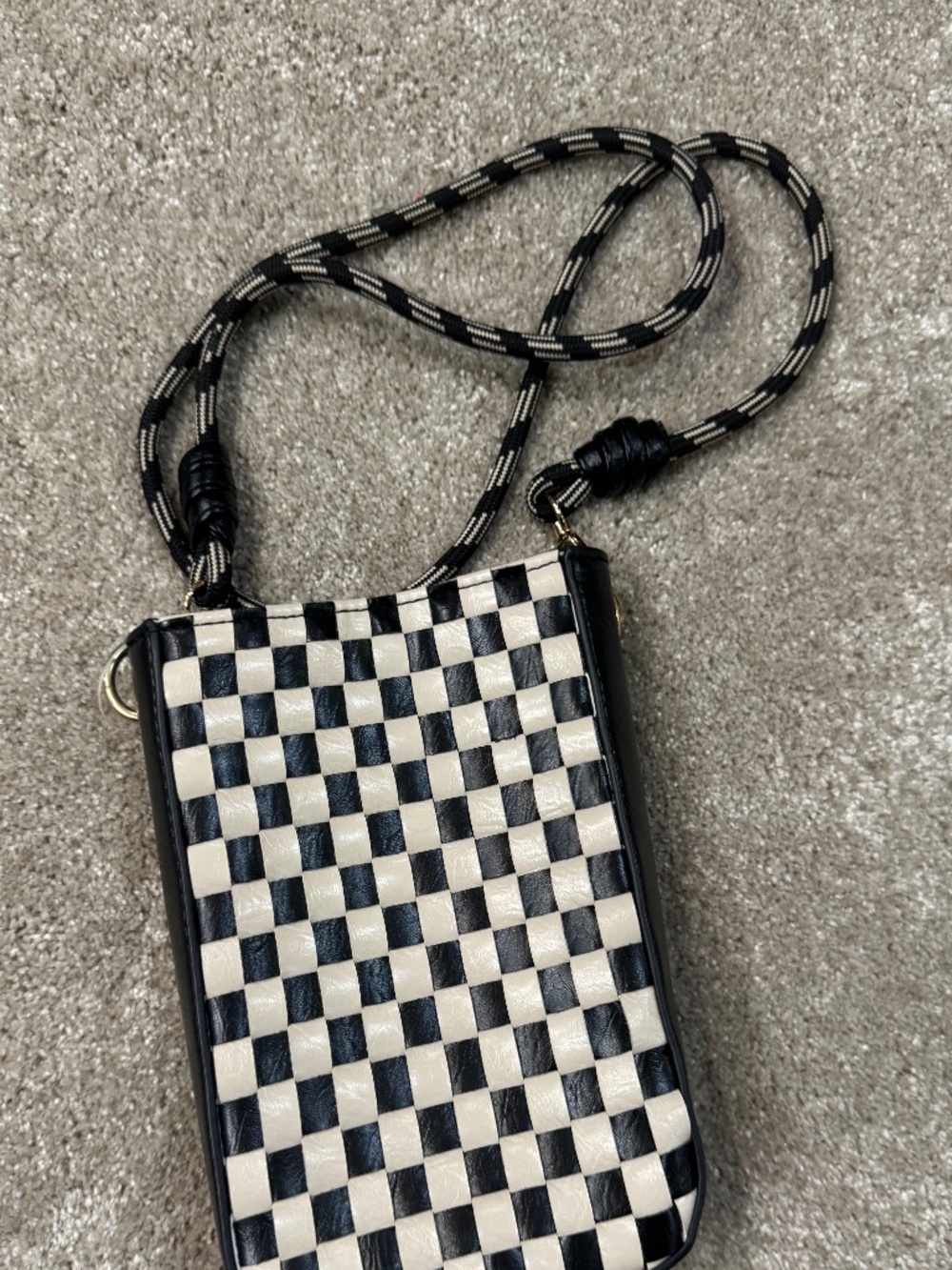 black and white woven purse